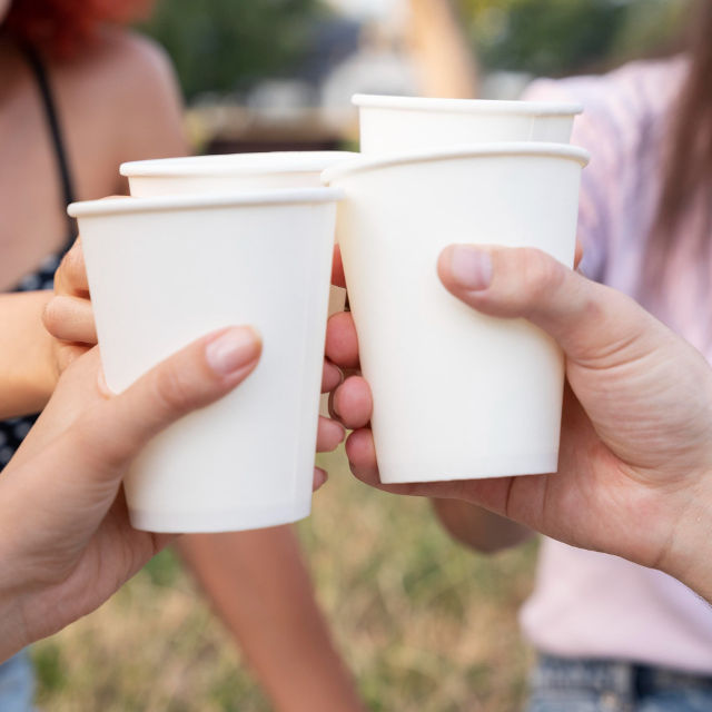 A collection of eco-friendly paper cups with various designs. (preview)